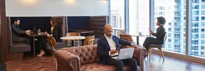 Business professionals use Servcorp’s breakout spaces for solo tasks, calls, and laptop work in comfort.