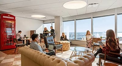 Servcorp’s premium lounge offers panoramic views, stylish seating, and a dynamic space for work, networking, and relaxation.